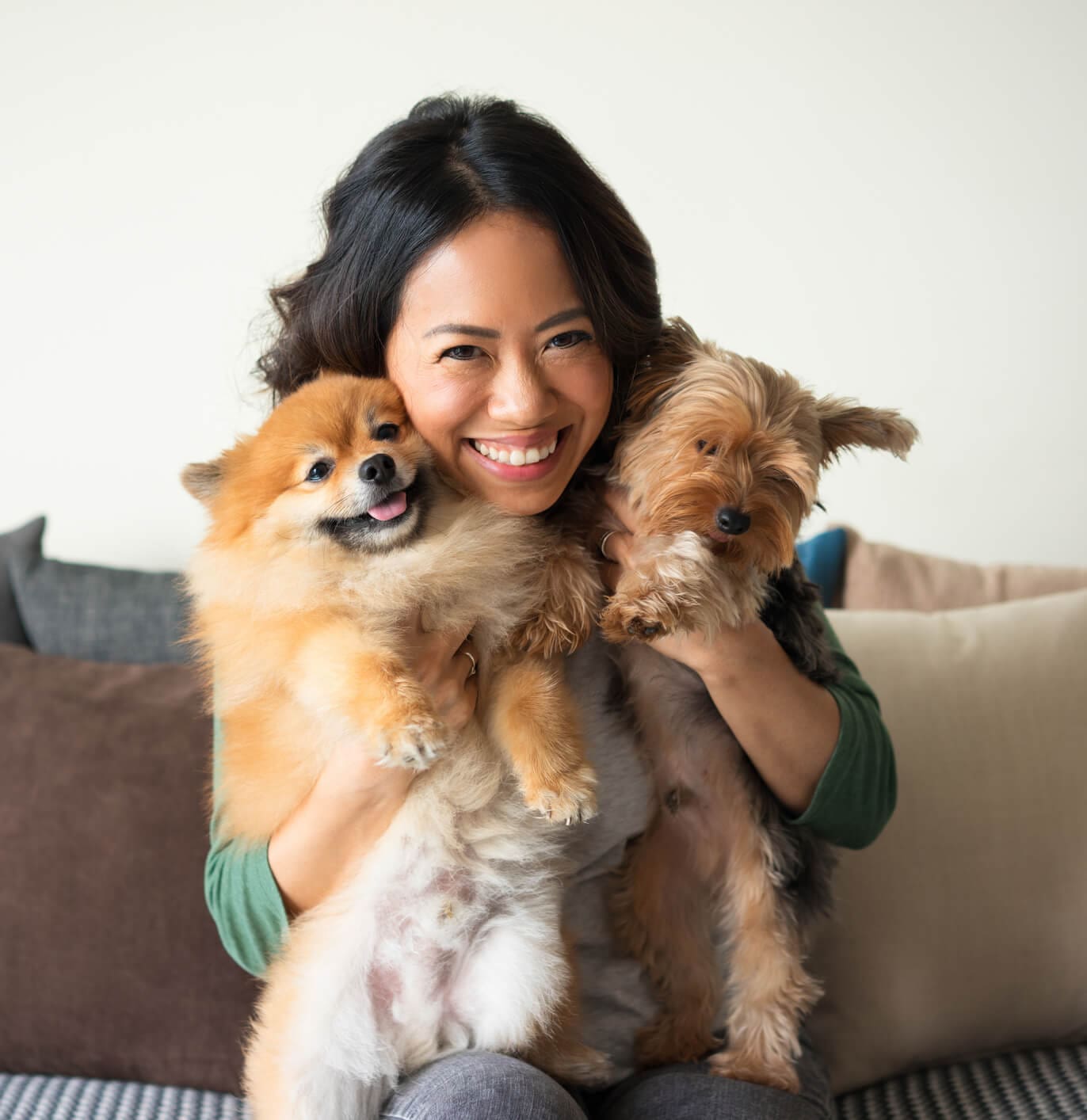 Woman Smiling With Two Dogs Woman Smiling With Two Dogs